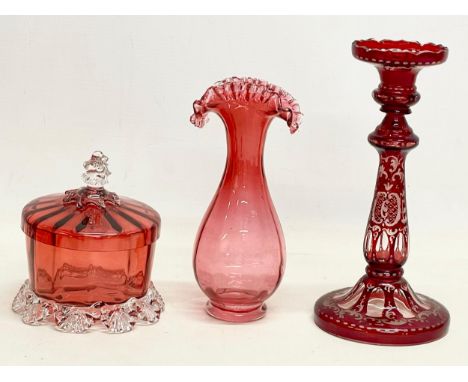 3 pieces of 19th century Ruby Glass. Bohemian Glass candlestick 23cm. A Victorian sweet jar with lid 12x13cm. Victorian vase 