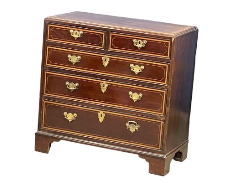 A good proportioned mid 19th century Georgian style inlaid mahogany chest of drawers on bracket feet. Circa 1850. 83x43x83.5c