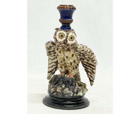 A vintage glazed pottery candlestick in the form of an owl. 20.5cm 