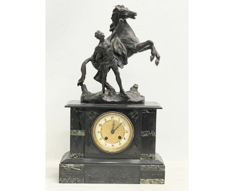 A large Victorian slate mantle clock. 30.5x14x52.5cm 
