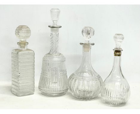 4 vintage decanters. 35cm 