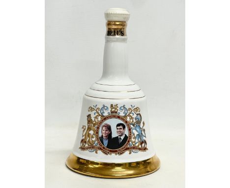 An unopened bottle of Bell’s Old Scotch Whisky. The Marriage of Prince Andrew with Miss Sarah Ferguson. By Wade. 75cl. 