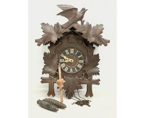 A late 19th century Black Forest cuckoo clock. 34x45cm 