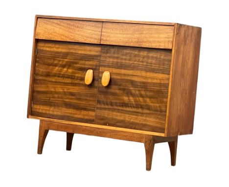 A 1950's Mid Century afromosia side cabinet.  91x36x81.5cm 