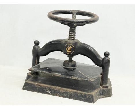 A Victorian cast iron book press. Closed 45x30x31.5cm 
