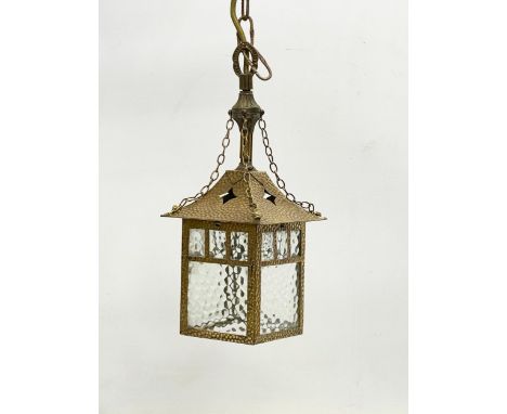 A vintage Arts &amp; Crafts style brass porch light. 54cm including chain. 