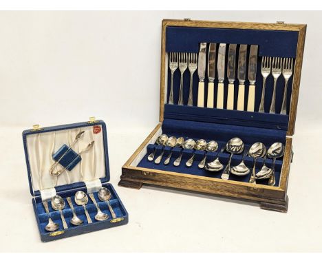 A canteen of cutlery with a set of Yeoman plate spoons and tongs. 