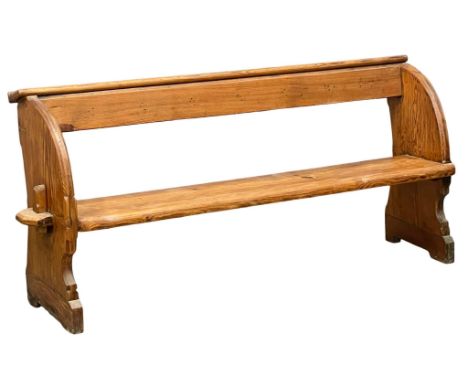 A large Victorian pitch pine bench. 190x48x90cm 
