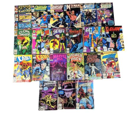 A collection of vintage 1980s Marvel Universe Comic books including She-Hulk, Power Pack, Cable, Daredevil, Indiana Jones, et