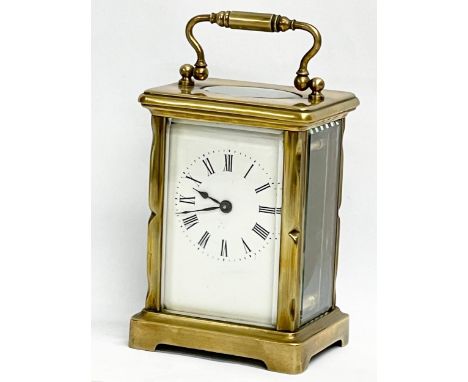 An early 20th century French brass carriage clock. Circa 1900. 8x6x15cm including handle. 