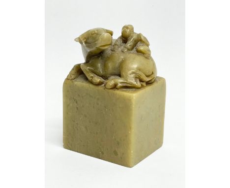 A 19th century Chinese jade figure. 5x4x8cm 