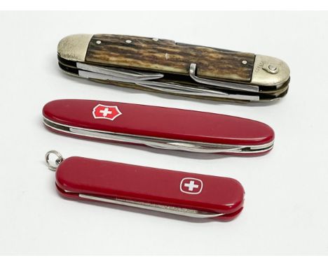 2 Swiss Army Knives and other. 