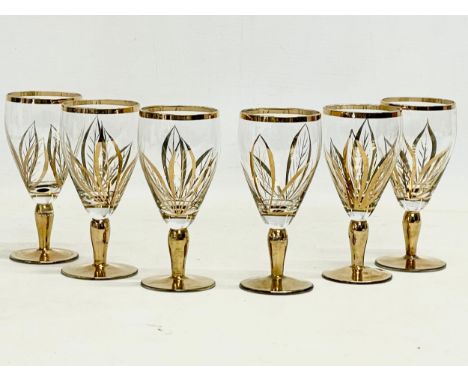 A set of 6 1950’s gilt crystal glasses. 11.5cm 