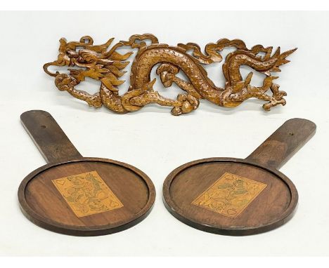 A pair of vintage Chinese game pads and a Chinese carved dragon wall plaque. 37cm 