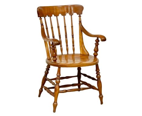 A good quality late 19th century Elm and Beech stick back kitchen armchair. 