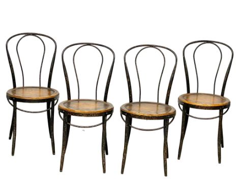 A set of 4 vintage bent metal chairs with elm seats. 