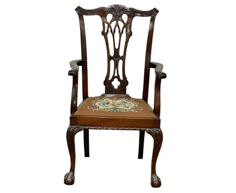 A early 20th century Chippendale Revival mahogany armchair with tapestry seat. 