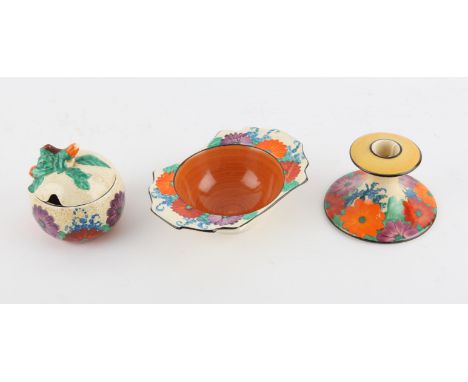 Bizarre by Clarice Cliff Newport Pottery Gay Day candlestick, 8 cm high, a flat handle bowl, 17 cm, and a lidded jam jar, 10 