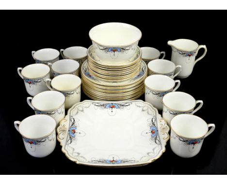 Shelley Art Deco tea set pattern 11572, comprising 12 cups, 9 saucers, 2 serving plates, cream jug, sugar bowl and 11 side pl