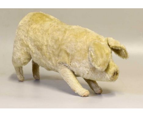 Early 20th Century Steiff Plush Mohair Standing Pig with blue glass eyes, button tag to the left ear, 36cm by 21cm