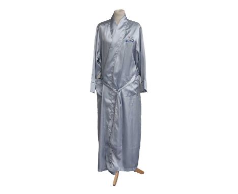 Circa 1990s Vivienne Westwood Pale Blue Silk Type Dressing Robe, embroidered with the orb to the chest, two patch pockets, si