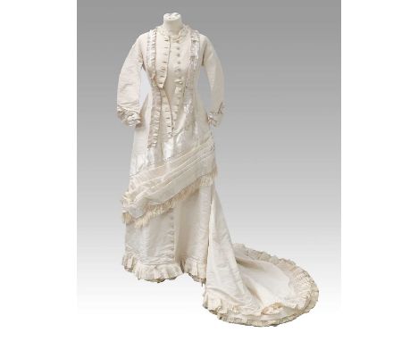 Victorian Cream Silk Wedding Dress with multi pleated trims to the front, cuffs and hem, button fastening, three quarter leng