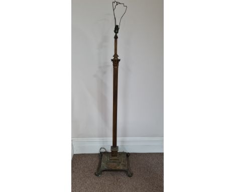 A brass finished heavy metal converted oil lamp stand. IMPORTANT: Online viewing and bidding only. Collection by appointment 