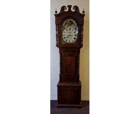 A Blurton Stourbridge oak and mahogany long cased moon phase clock, approx. height 220cm. IMPORTANT: Online viewing and biddi