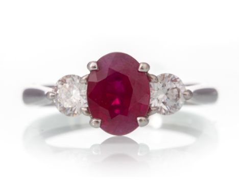 set with a central ruby of approximately 1.44 carats, flanked by diamonds totalling approximately 0.50 carats, in eighteen ca