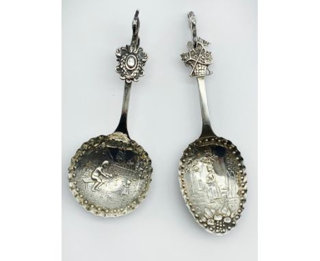 TWO ANTIQUE ORNATE SILVER DUTCH TEA CADDY SPOONS