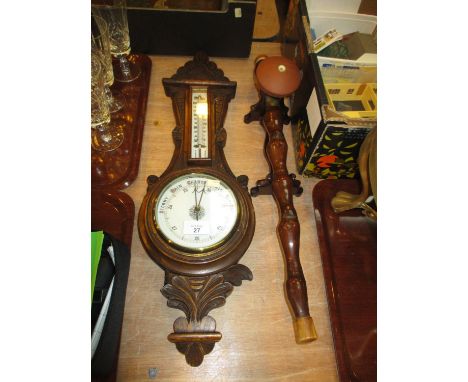 Carved Oak Aneroid Barometer and an Ornamental Pipe 
