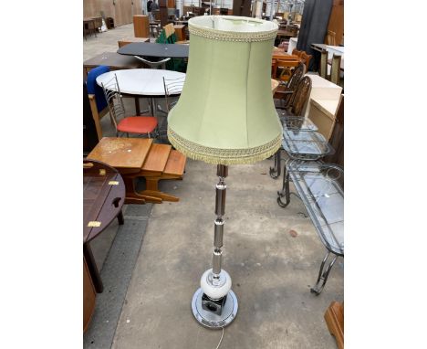 A 1970'S STANDARD LAMP WITH SHADE ON A POLISHED METAL COLUMN WITH CUBE BASE 