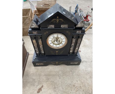 A LARGE HEAVY SLATE MANTLE CLOCK WITH WINDING KEY 