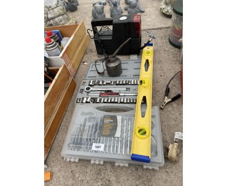 AN ASSORTMENT OF TOOLS TO INCLUDE ASOCKET SET, DRILL BIT SET AND A COMPRESSOR ETC 