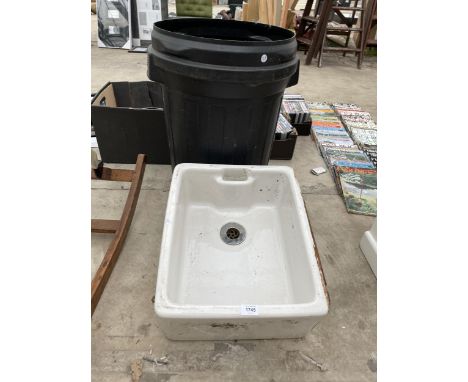 A SMALL WHITE GLAZED BELFAST SINK 