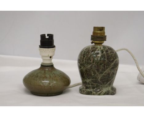 TWO STONEWARE LAMP BASES TO INCLUDE A VERY HEAVY ONE, BELIEVED TO BE MADE FROM CORNISH SERPENTINE FROM THE LIZARD PENINSULA. 