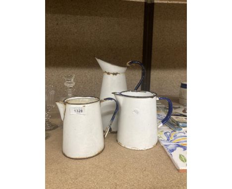 THREE GRADUCATED VINTAGE ENAMEL JUGS 