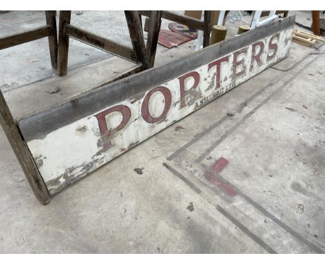 A LARGE VINTAGE WOODEN 'PORTERS' SIGN 