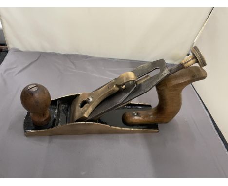 A VINTAGE BRASS BODIED PLANE 