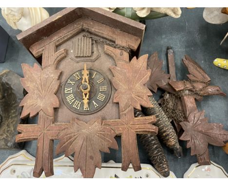 A BLACK FOREST CUCKOO CLOCK 