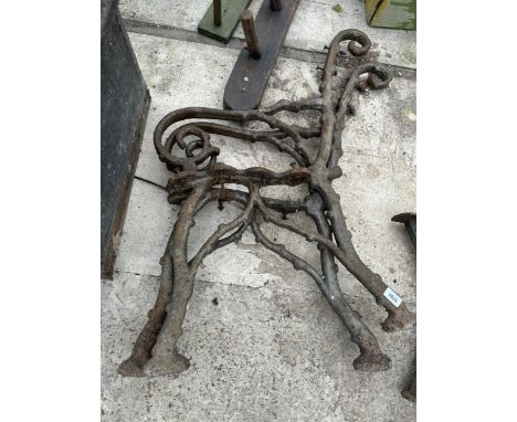 A PAIR OF VINTAGE KNOTTY CAST BENCH ENDS 