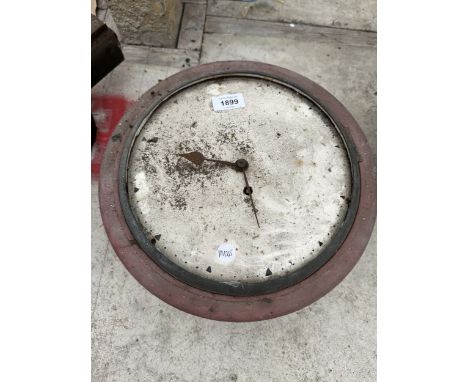 A VINTAGE WOODEN CLOCK FACE 