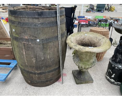 AN OAK BARREL AND A CONCRETE URN PLANTER (A/F) 