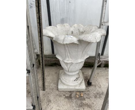 A CONCRETE PETAL URN PLANTER 