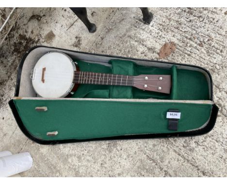 A VINTAGE BANJO WITH CARRY CASE 