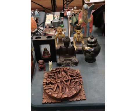 A COLLECTION OF ASIAN ITEMS TO INCLUDE A WALL PLAQUE, BUDDAH FIGURES, LARGE WOODEN FIGURES, A FOO DOG, GINGER JAR AND JADE ST