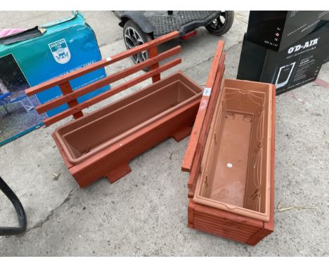 TWO WOODEN TROUGH PLANTERS WITH PLASTIC LINERS 