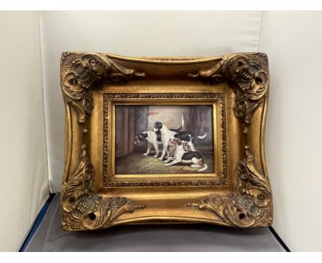 A PRINT OF THREE DOGS IN A HEAVY GILDED FRAME PRINT SIZE 18CM X 12CM 