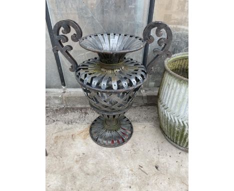 A DECORATIVE METAL PLANTER/ARTIFICIAL FLOWER VASE 