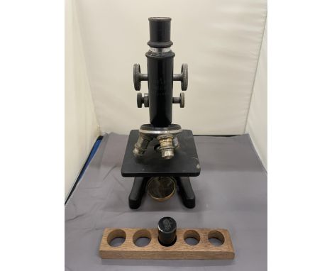 AN ERNST LEITZ WETZLAR MICROSCOPE, NO. 324603, WITH WOOD TRAY AND SPARE LENS 